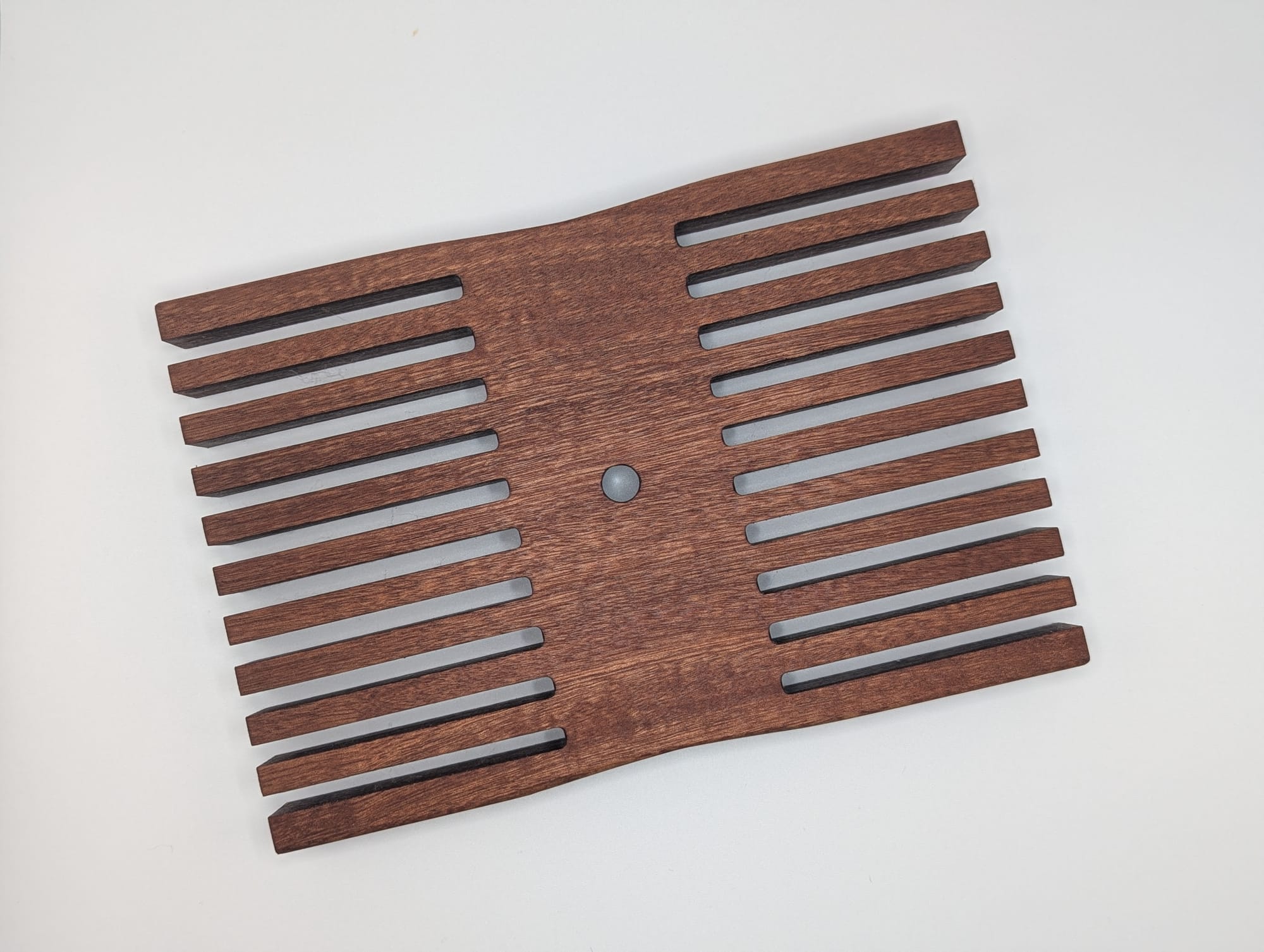 Cable hanger made out of sapeli wood, coming soon